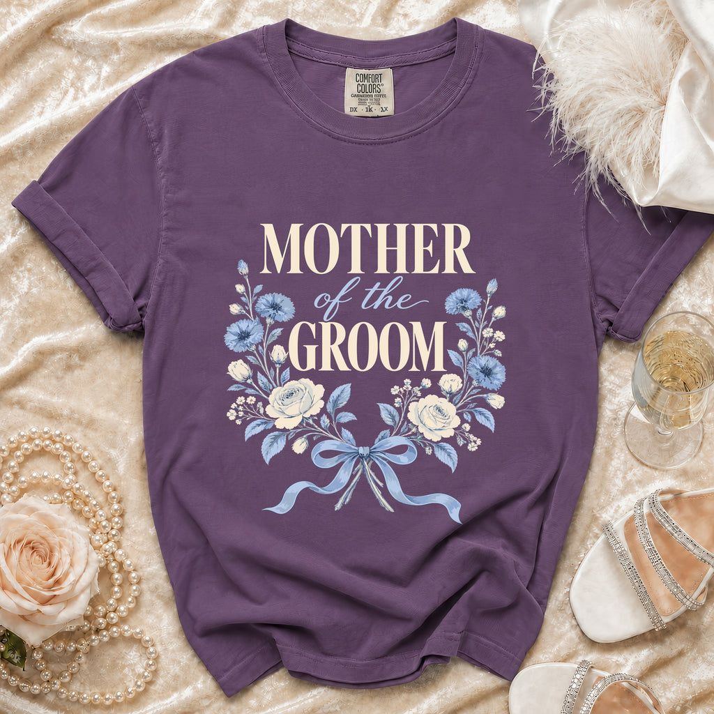 Purple t-shirt with "Mother of the Groom" text and floral design.