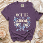 Purple t-shirt with "Mother of the Groom" text and floral design.