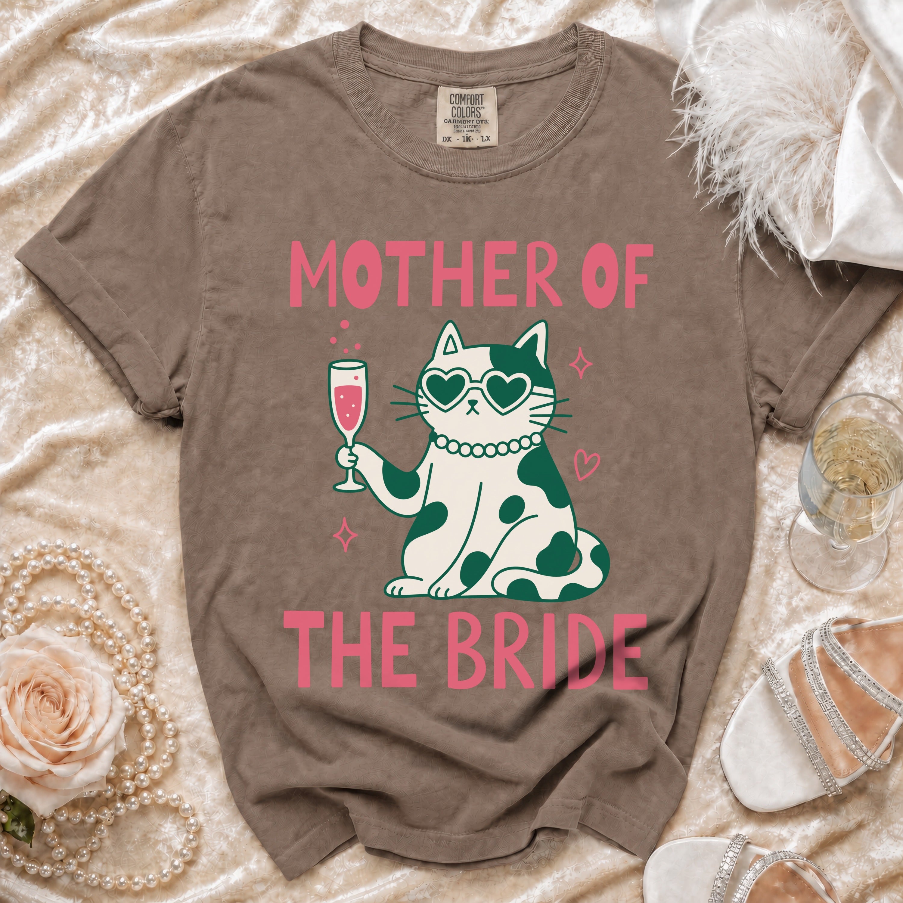 Brown t-shirt with "Mother of the Bride" text and a cat holding champagne.