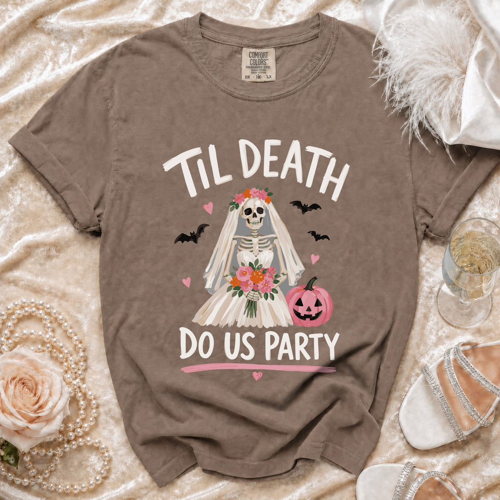 T-shirt with skeleton bride, bats, pink pumpkin, and text "Til Death Do Us Party".