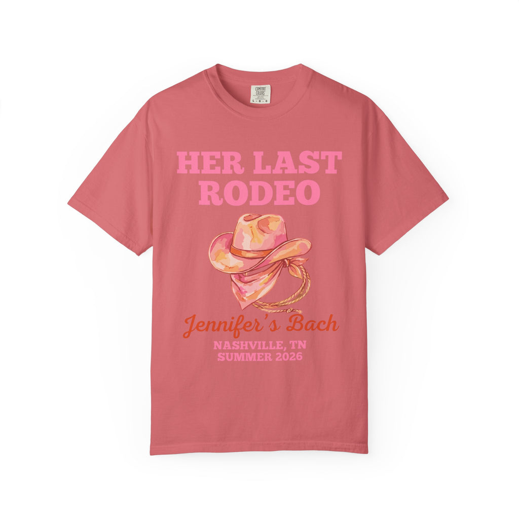 Pink t-shirt with "Her Last Rodeo" text and cowboy hat graphic.