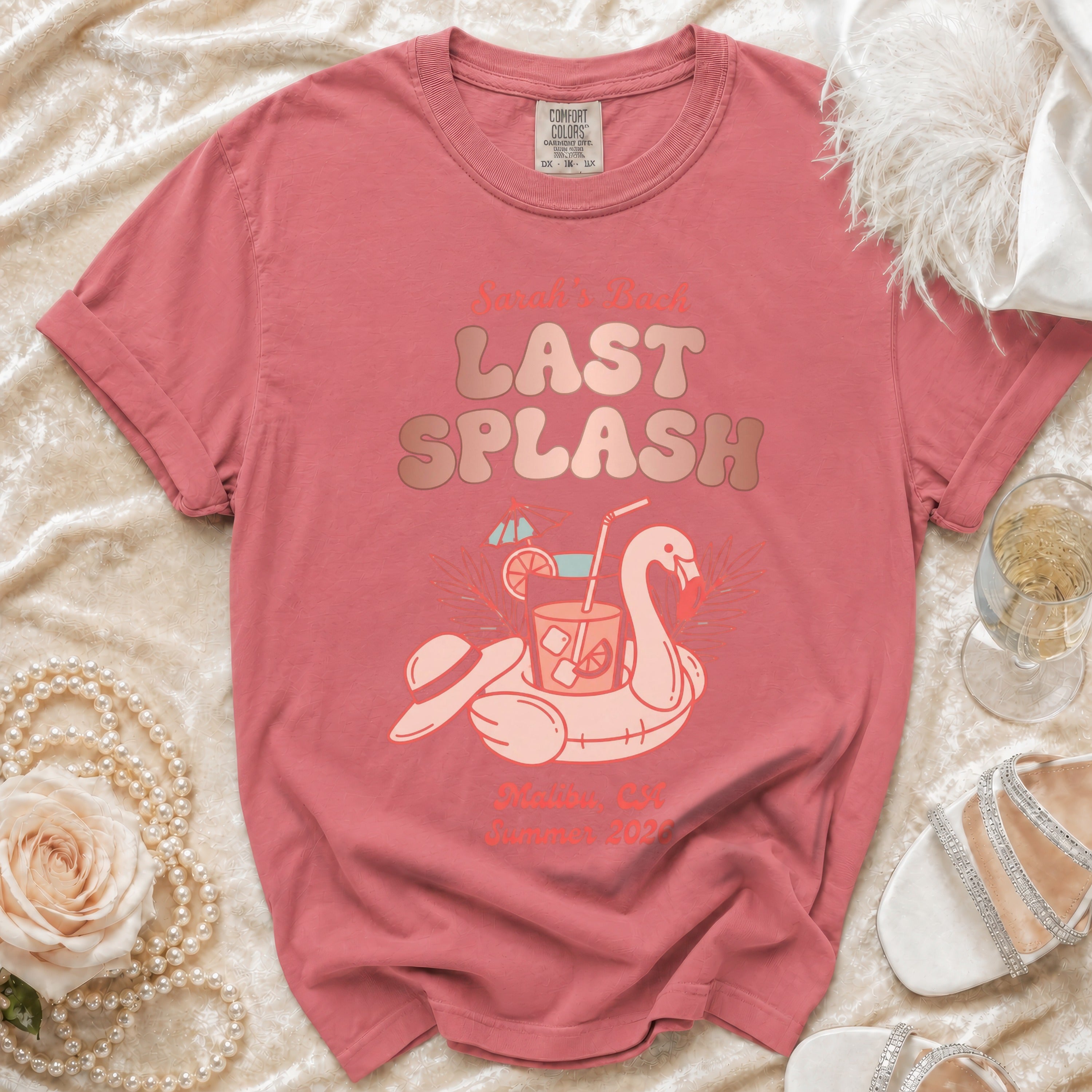 Pink t-shirt with "Sarah's Back Last Splash" text and flamingo float graphic.