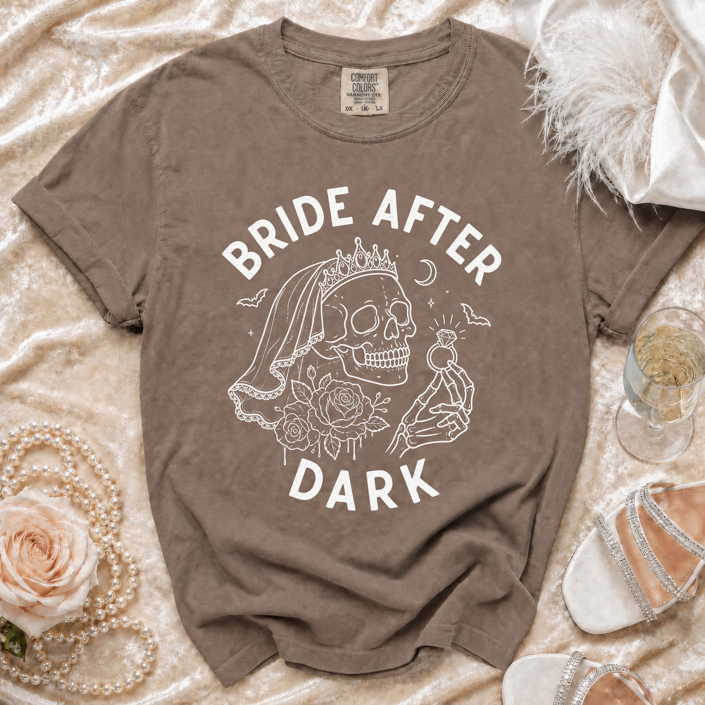 Brown t-shirt with white "BRIDE AFTER DARK" text and skull graphic.