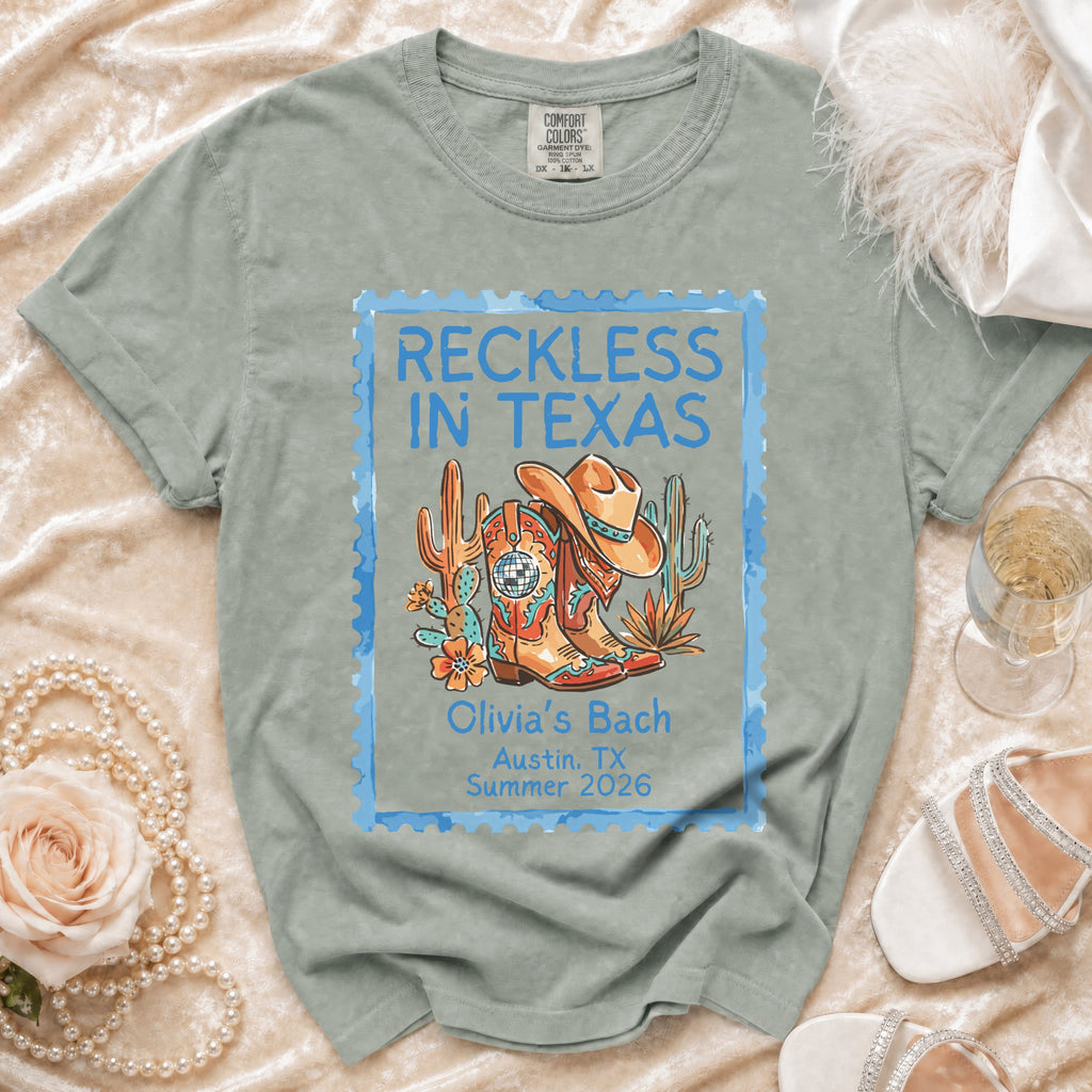 Comfort Colors t-shirt with "Reckless in Texas" and event details.