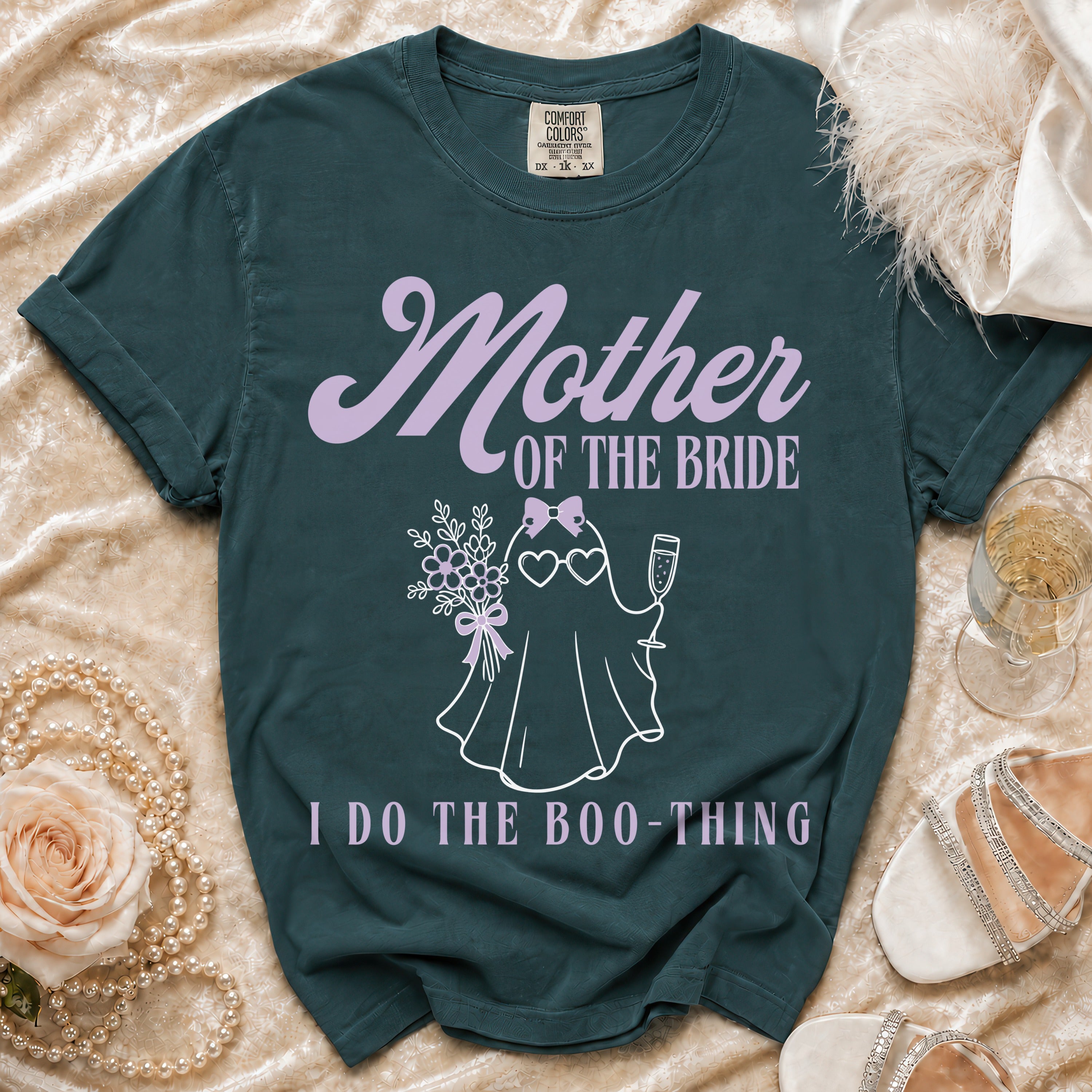 Green t-shirt with "Mother of the Bride" and a ghost graphic.