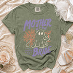 Green t-shirt with "Mother of the Bride" graphic, ghost, and flowers.