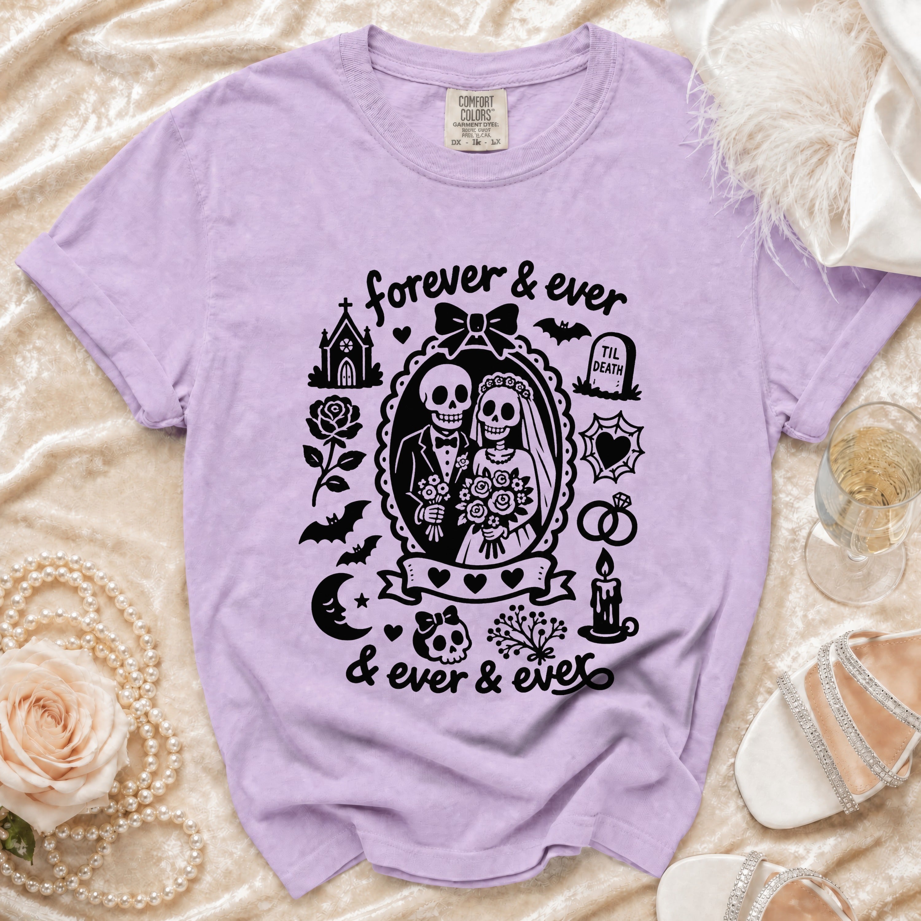 Purple t-shirt with skeleton bride and groom graphic wearing "forever & ever" text.