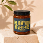 Candle with label "WARNING: THE HONEYMOON NEVER ENDS THIS IS NOT A DRILL VOWED".