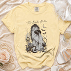 Yellow t-shirt with gothic bride illustration and "This Bride Bites" text.