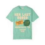 Teal t-shirt with "Her Last Rodeo" and Nashville, TN Summer 2026 graphic.