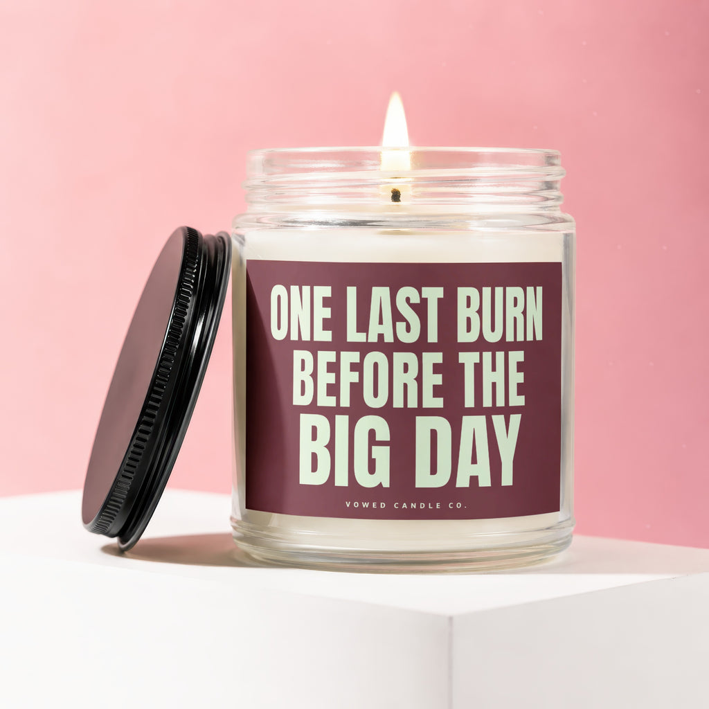 Soy candle with "One Last Burn Before the Big Day" text and a lit wick.