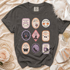 Dark gray t-shirt with nine Halloween-themed bridal party patches.