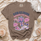 Brown t-shirt with "Maid of Honor Professional Panic Manager" graphic, flowers, and accessories.