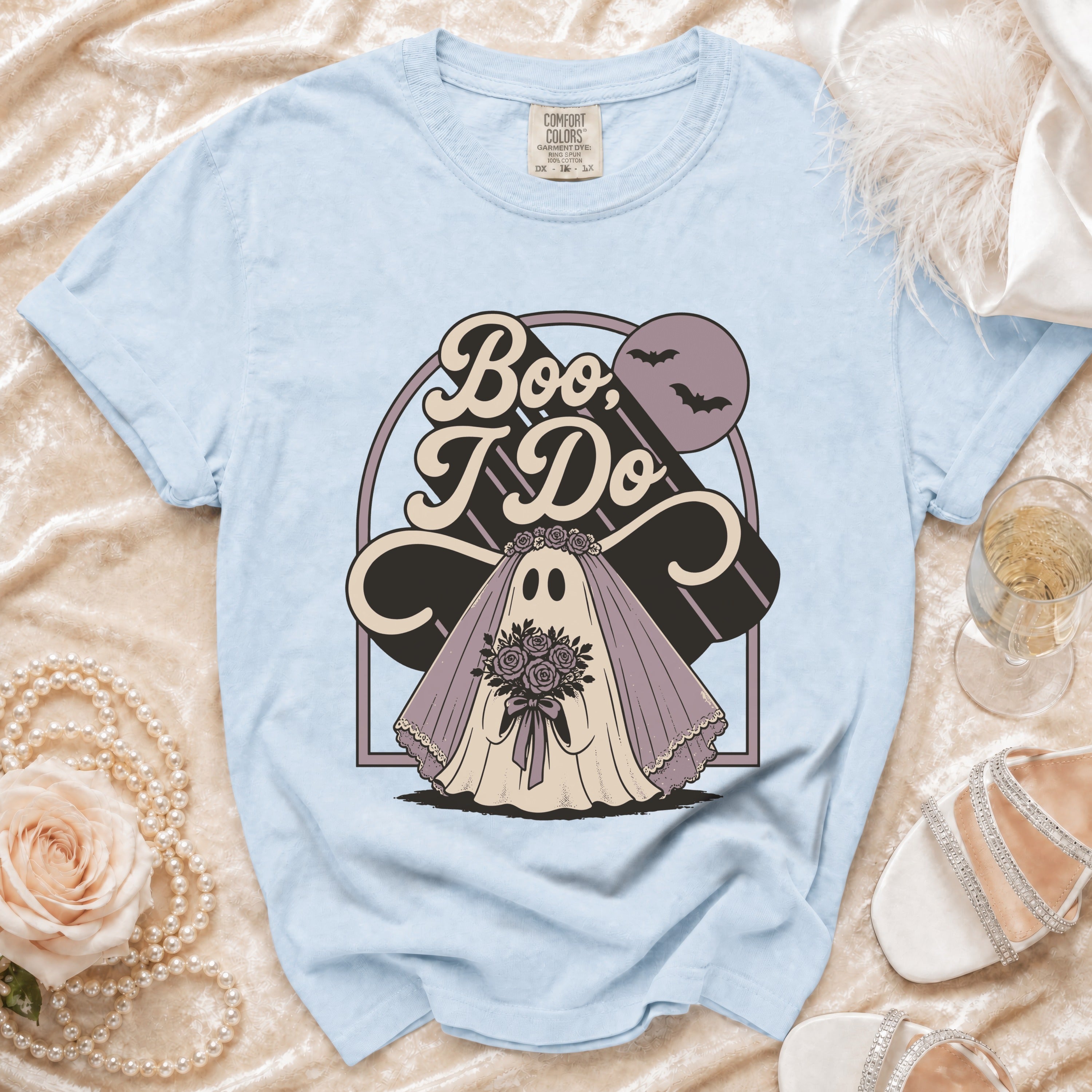 Light blue t-shirt with a ghost bride graphic saying "Boo, I Do".