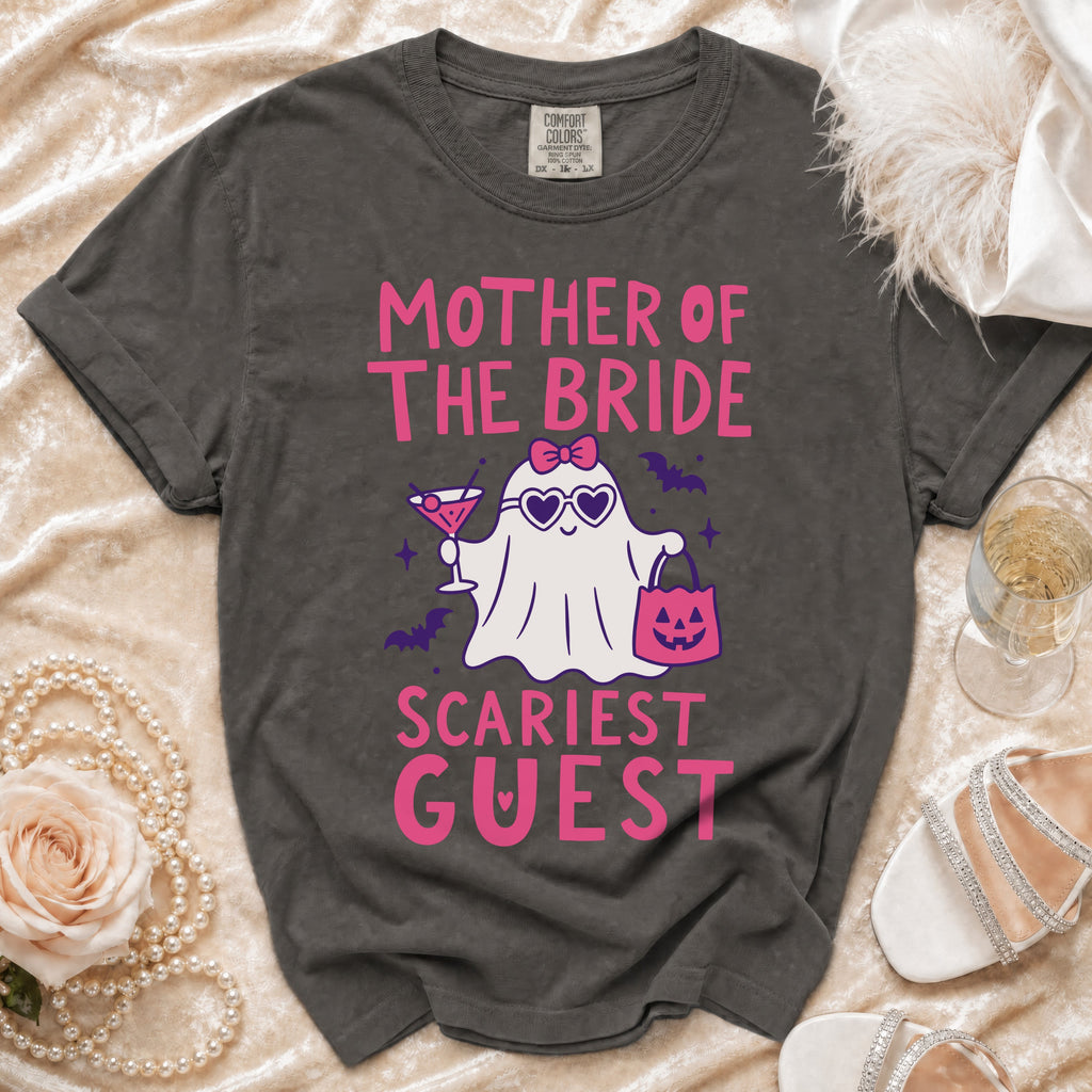 Dark grey t-shirt with pink text "Mother of the Bride Scariest Guest" and a ghost graphic.