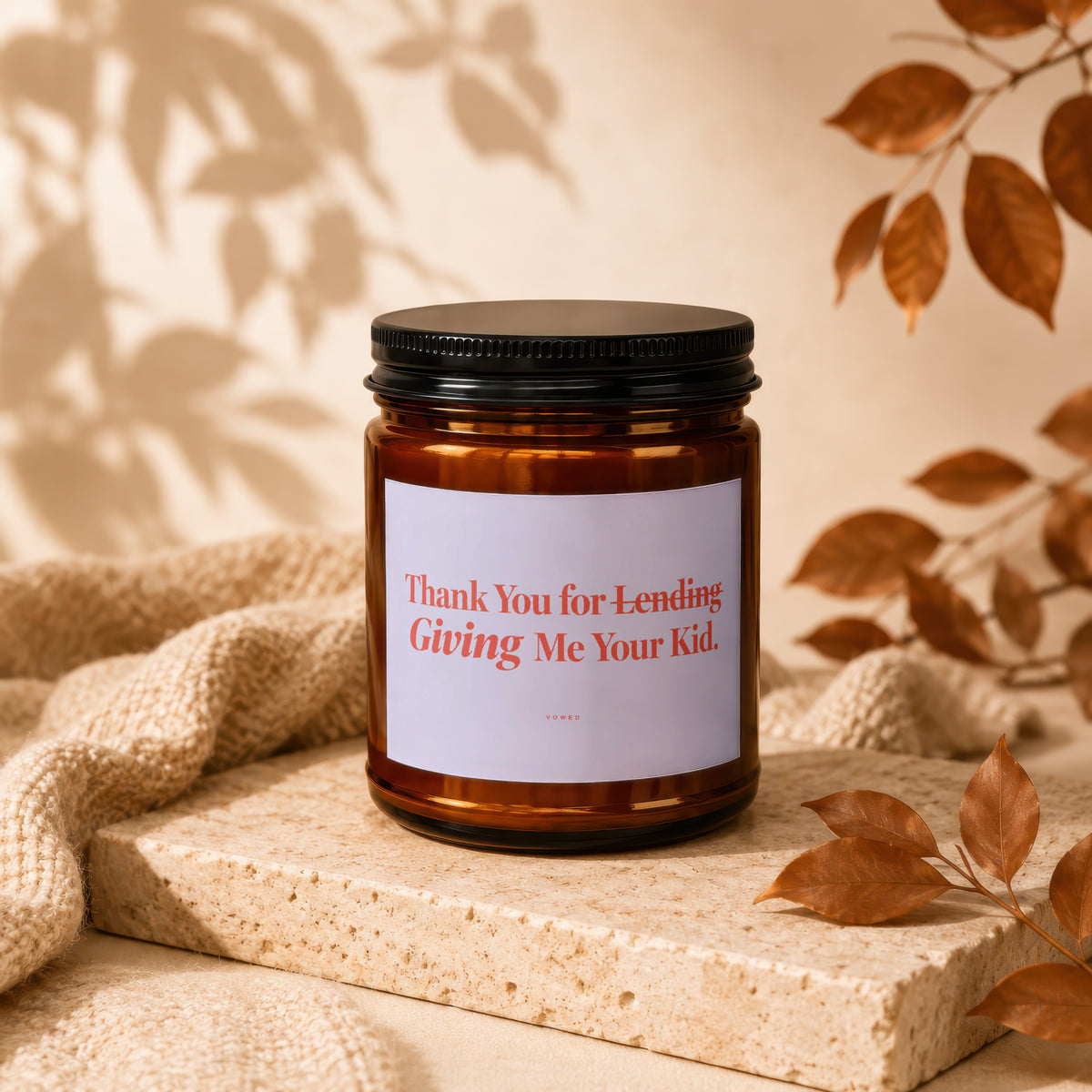 Amber candle with black lid, "Thank You for Lending Giving Me Your Kid." text.
