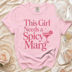Pink t-shirt with "This Girl Needs a Spicy Marg" text and graphic.
