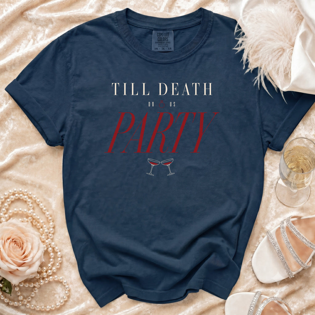 Navy t-shirt with "Till Death Do Us Party" text and champagne glasses graphic.
