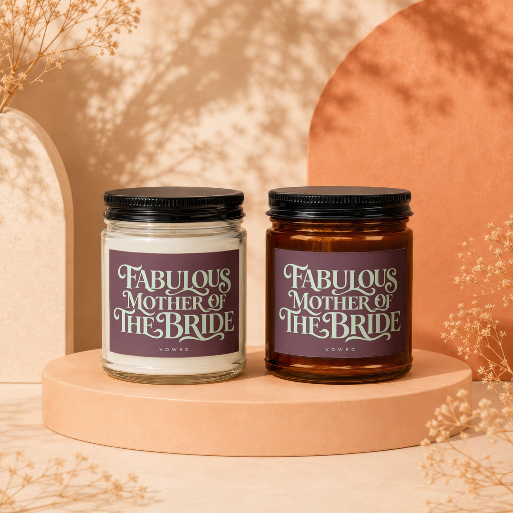 Two lit candles, one clear and one amber, with "Fabulous Mother of the Bride" text.