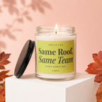 Burning candle in a glass jar with label: "Smells Like Same Roof, Same Team, Every Single Day, Vowed".