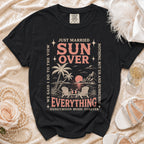 T-shirt with "Just Married Sun Over Everything Honeymoon Mode: Forever" graphic.