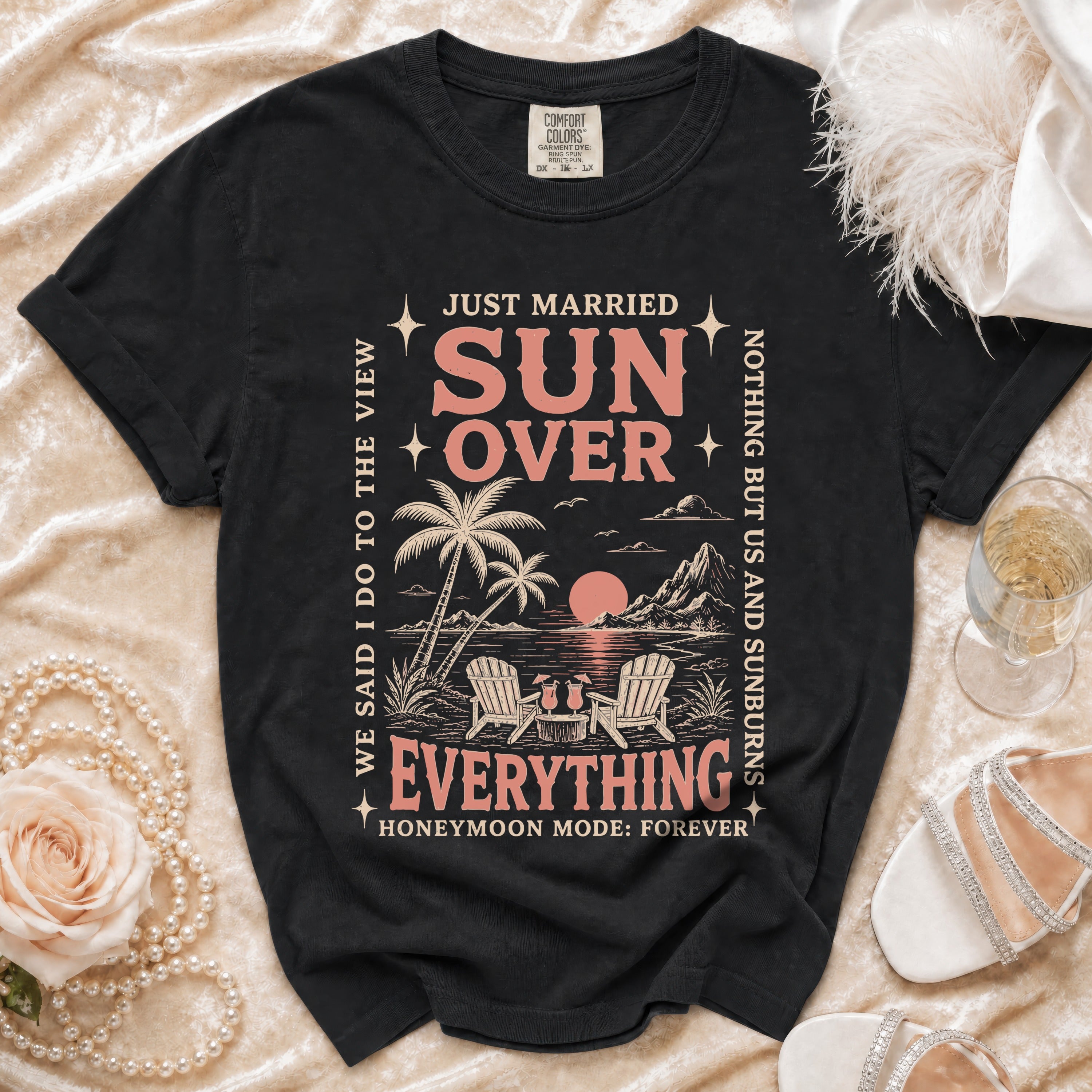 T-shirt with "Just Married Sun Over Everything Honeymoon Mode: Forever" graphic.