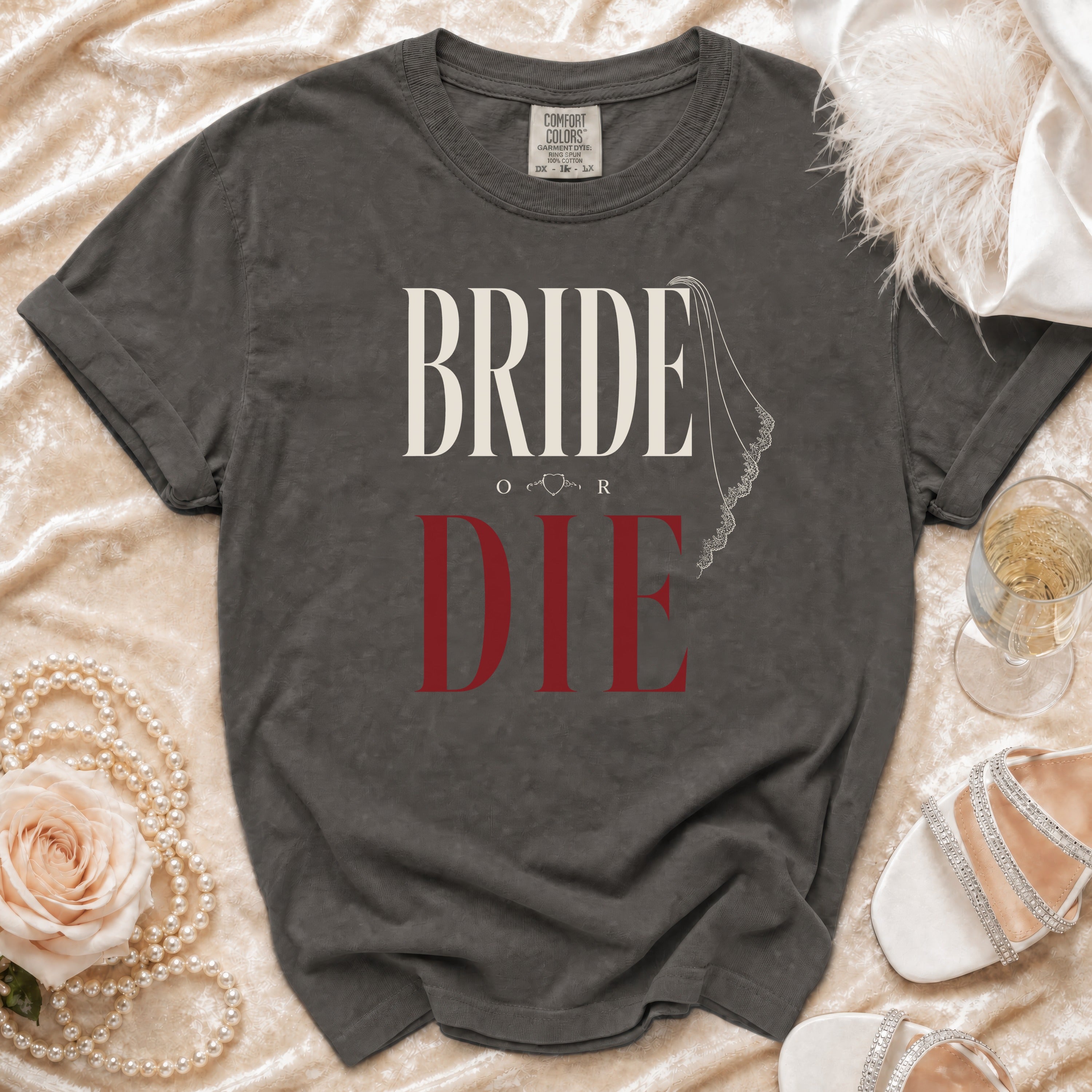 Dark grey t-shirt with "BRIDE OR DIE" text and veil graphic.