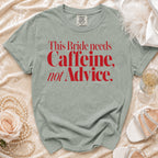 "This Bride needs Caffeine, not Advice." graphic tee on a light green shirt.