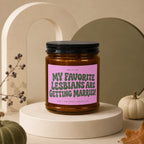 Candle with pink label that reads "My Favorite Lesbians Are Getting Married!".