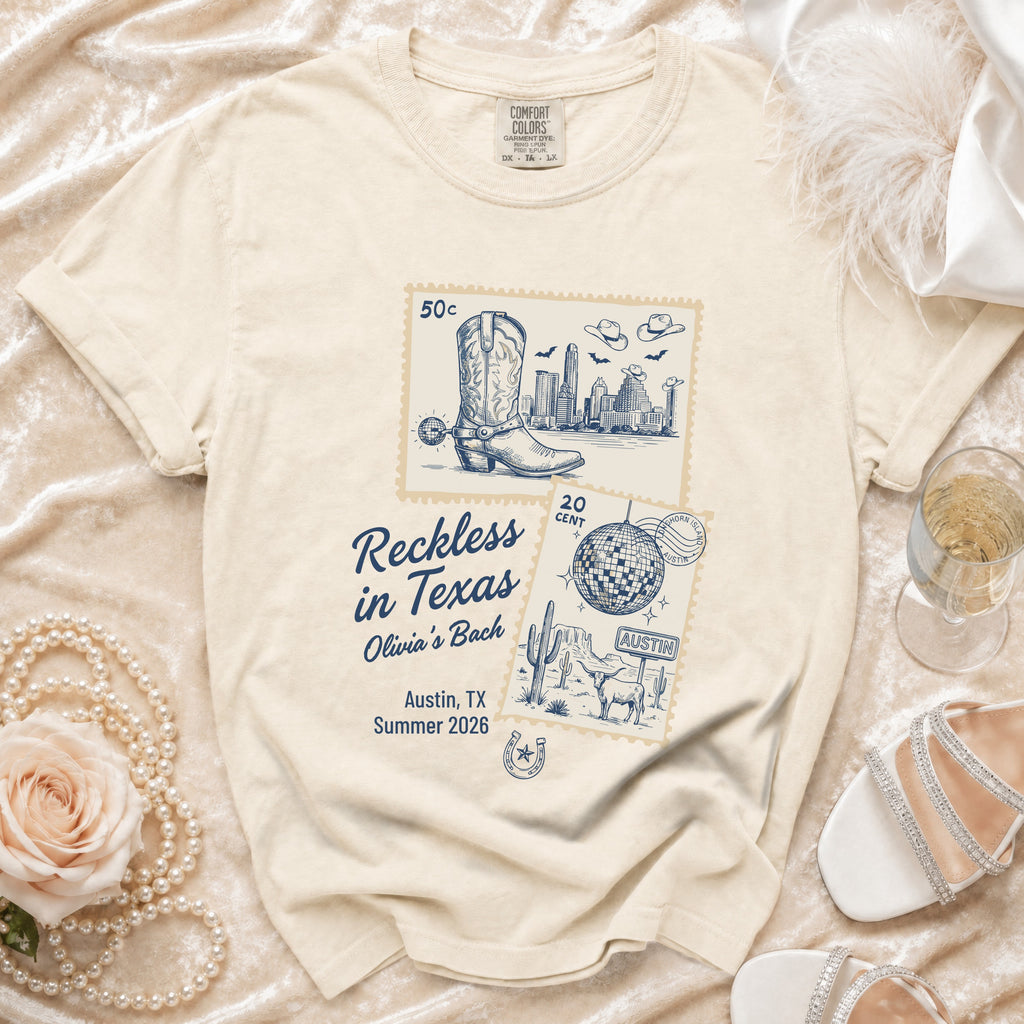 Cream t-shirt with "Reckless in Texas Olivia's Bach Austin, TX Summer 2026" graphic.