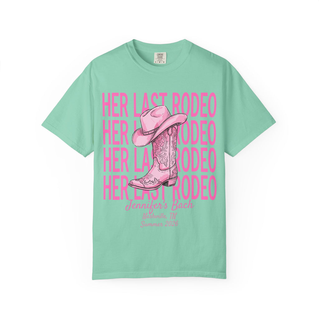 Mint t-shirt with pink text "HER LAST RODEO" and cowboy boot graphic.