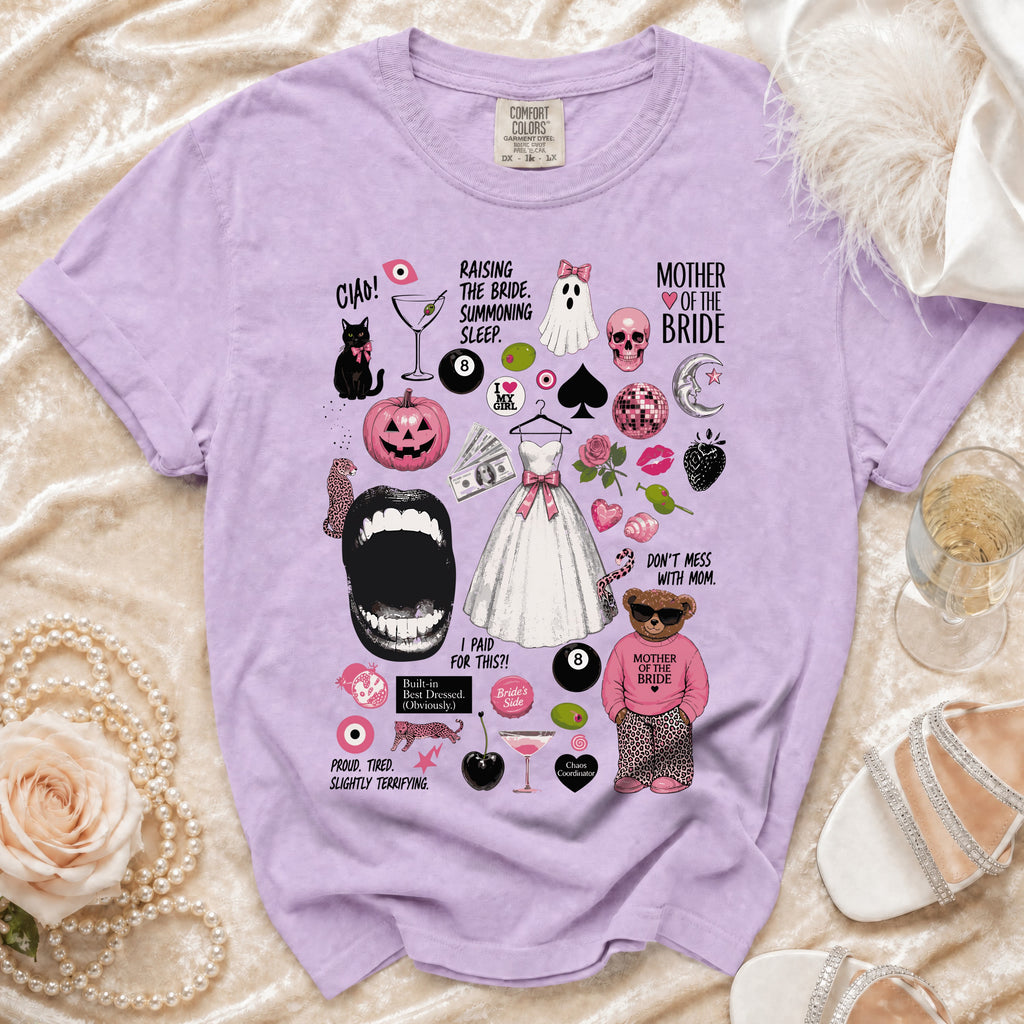 Purple t-shirt with "Mother of the Bride" graphics including a bear, wedding dress, and spooky elements.