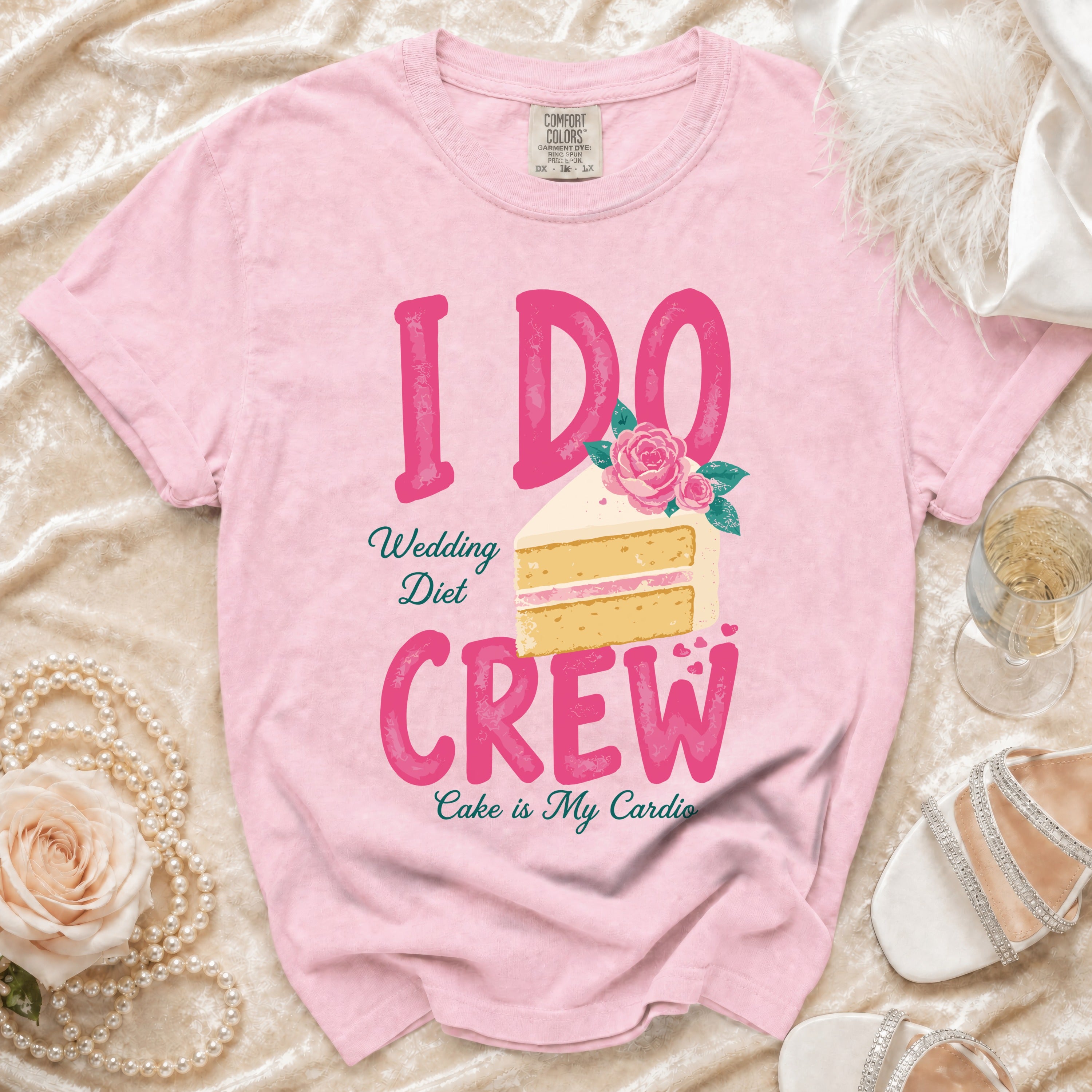 Pink t-shirt with "I DO Wedding Diet CREW Cake is My Cardio" text and cake graphic.