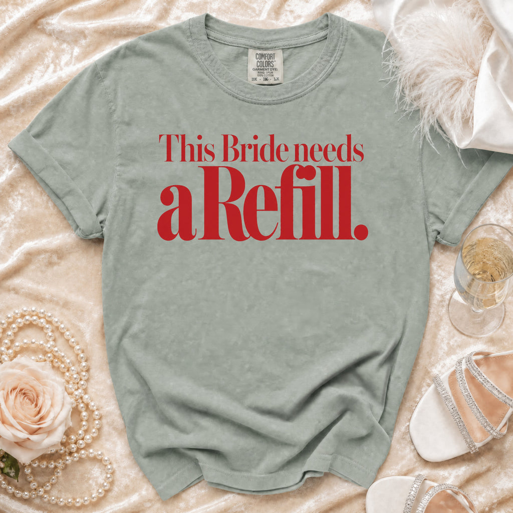 Gray t-shirt with red text reading "This Bride needs a Refill."