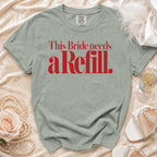 Gray t-shirt with red text reading "This Bride needs a Refill."