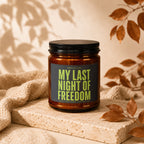 Amber candle labeled "My Last Night of Freedom" with a black lid.