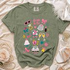 Olive green t-shirt with "Bride to Be" text and wedding themed graphics.