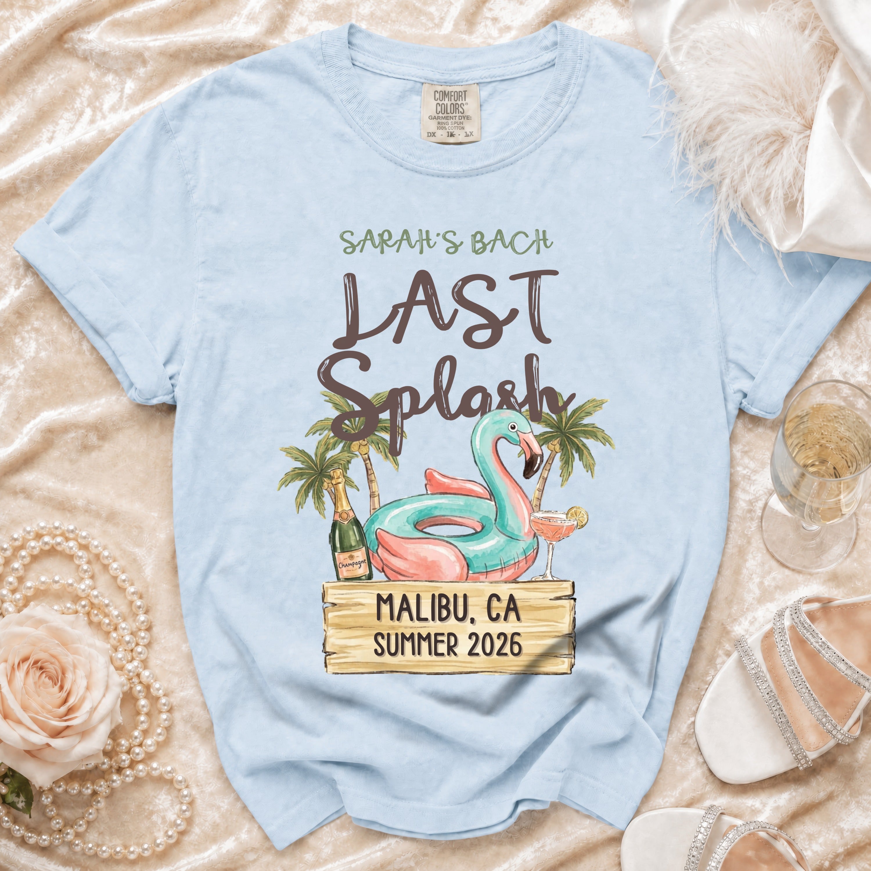 Light blue t-shirt with "Sarah's Bach Last Splash Malibu, CA Summer 2026" text.