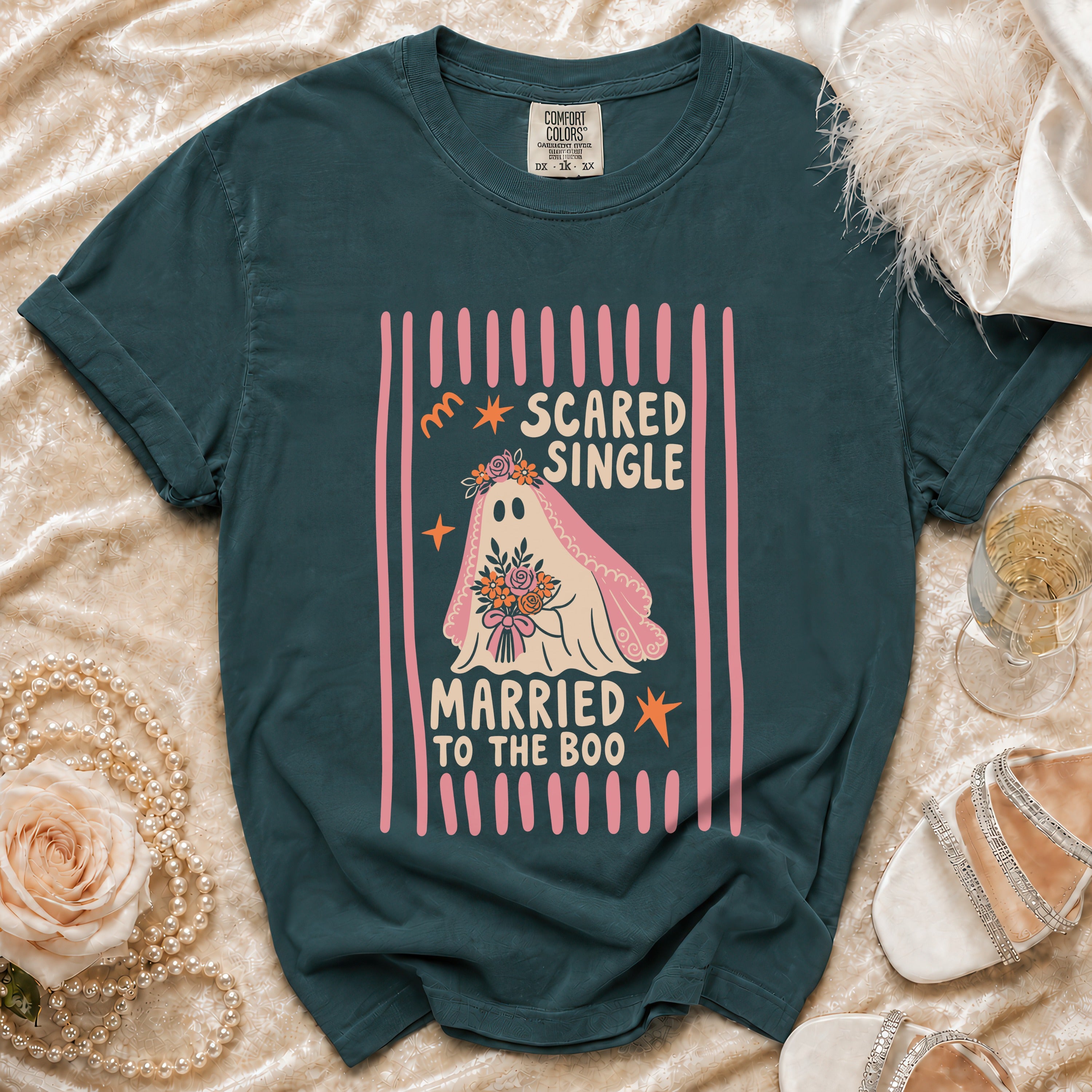 Teal t-shirt with ghost bride graphic reading "Scared Single Married to the Boo."