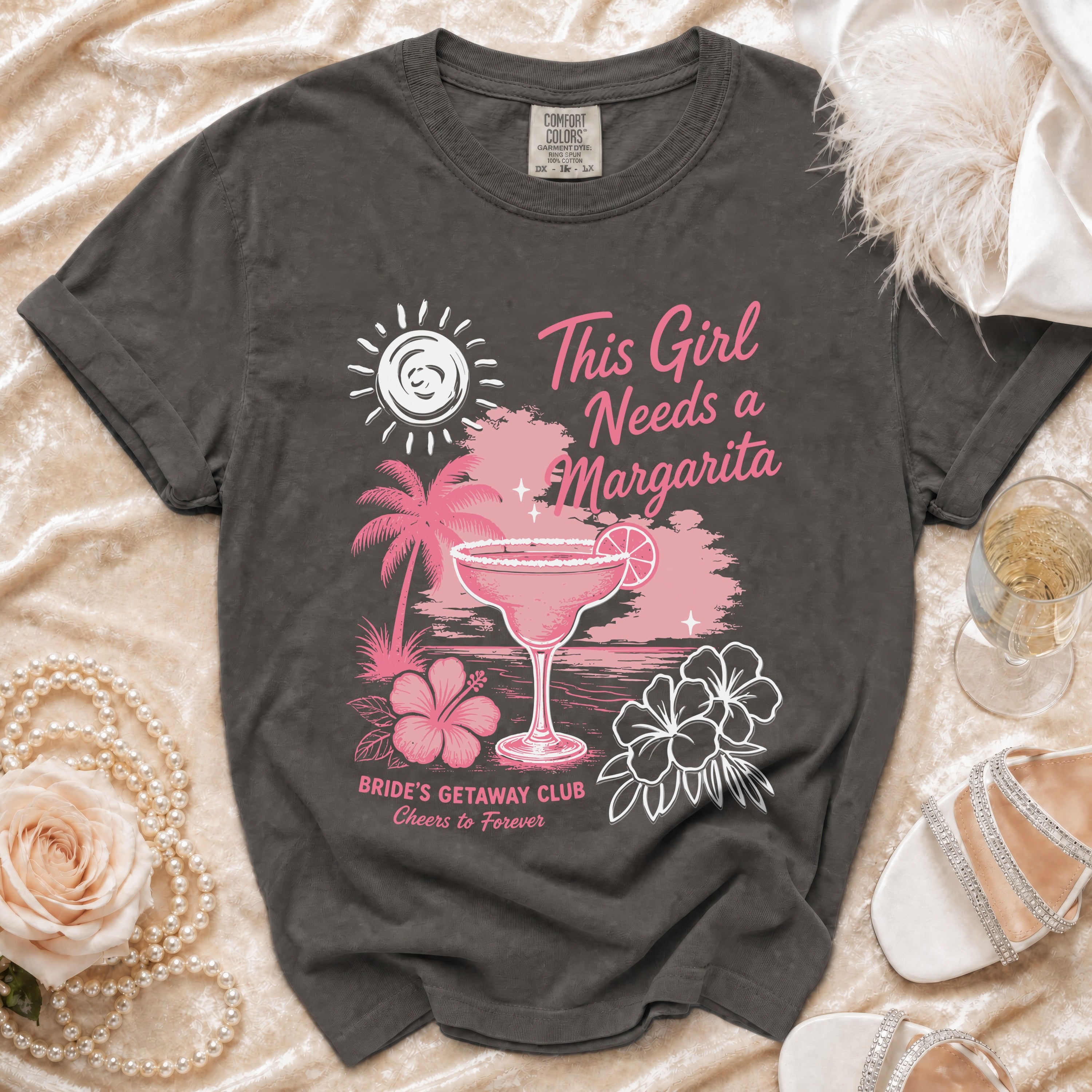Gray t-shirt with margarita, palm trees, and text "This Girl Needs a Margarita."