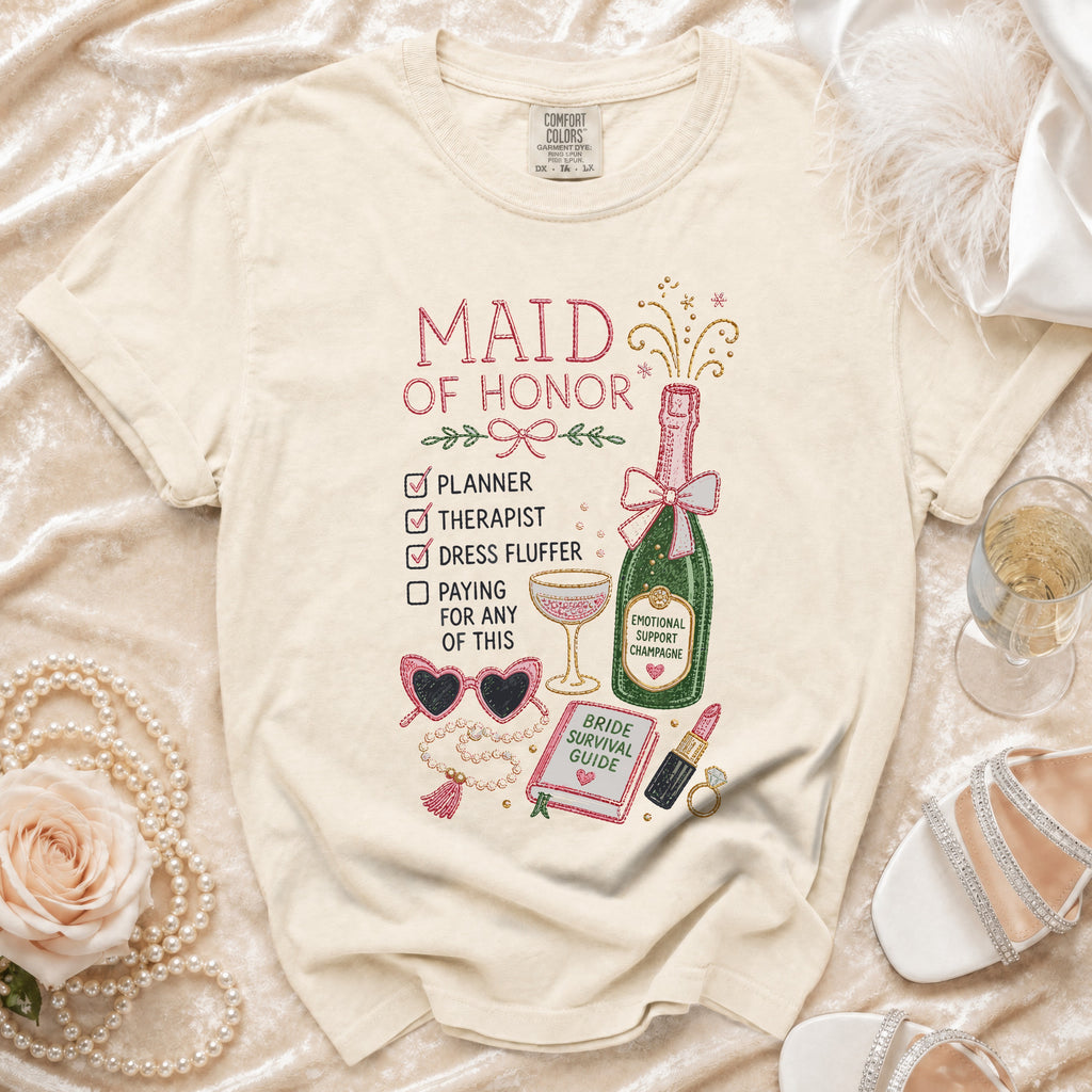 Maid of Honor t-shirt with checklist, champagne, and bridal accessories graphic.