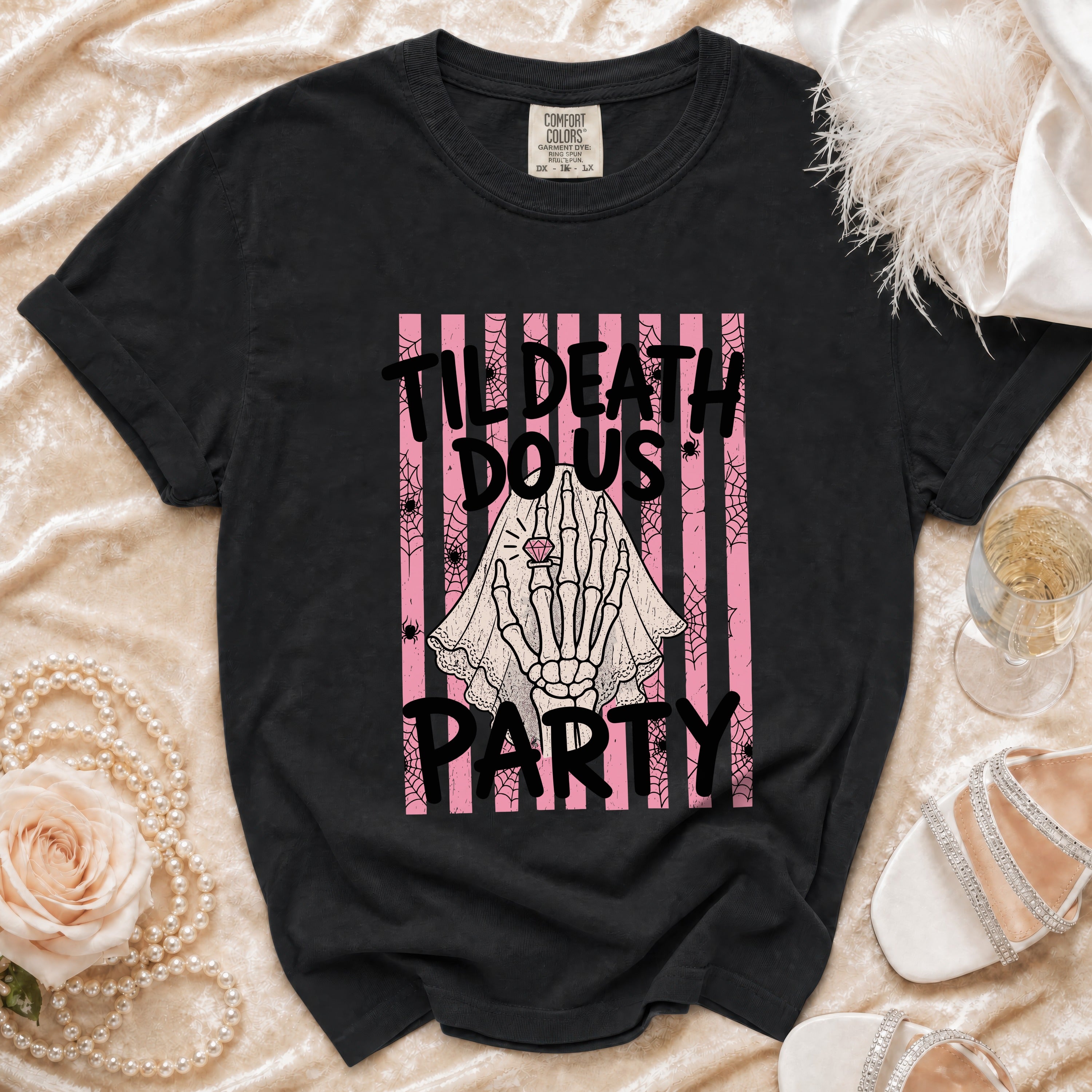 Black t-shirt with skeleton hand, ring, veil, and text "Til Death Do Us Party".