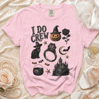 Pink t-shirt with "I DO CREW" text and Halloween-themed graphics.