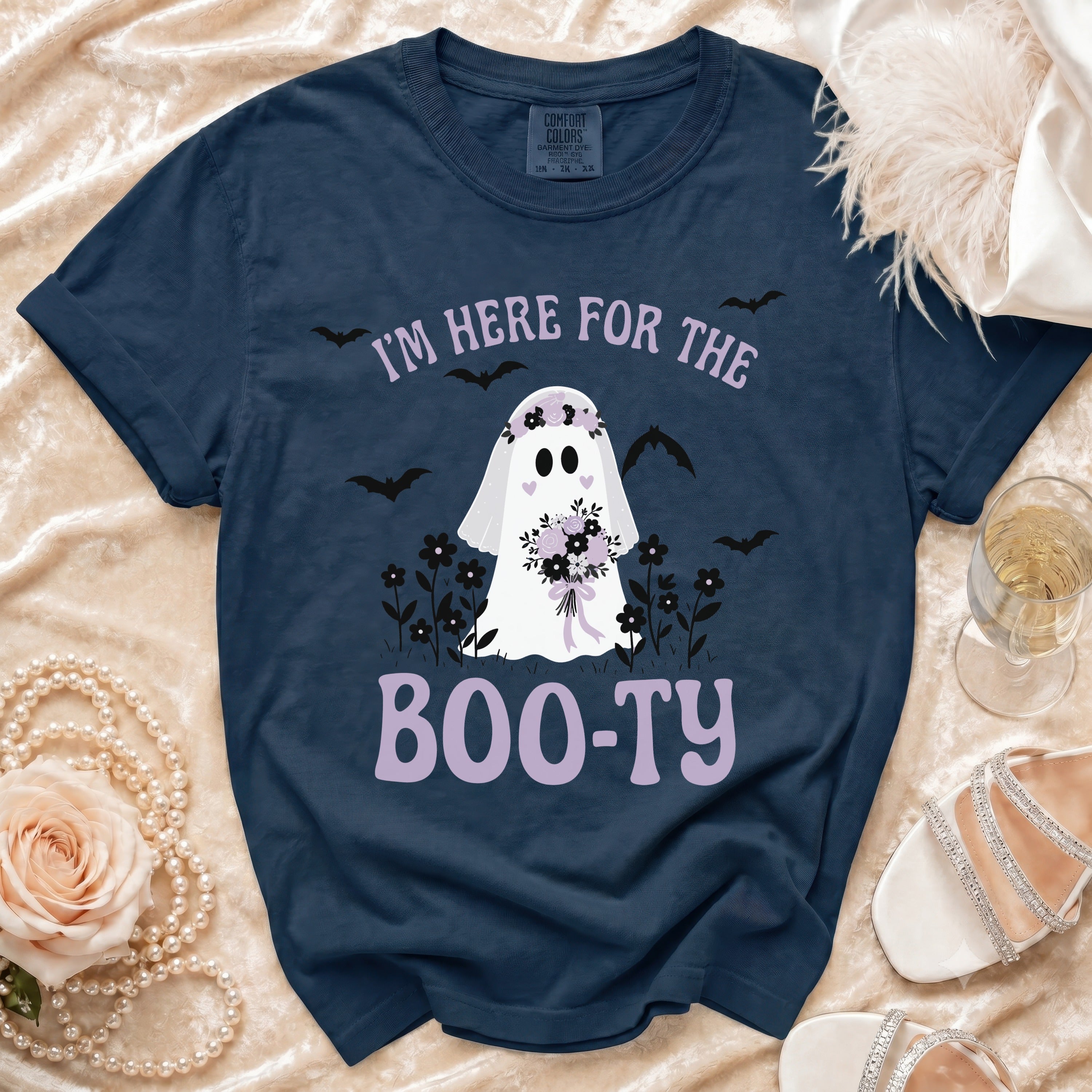 Dark blue t-shirt with ghost wearing flower crown, "I'M HERE FOR THE BOO-TY" text.