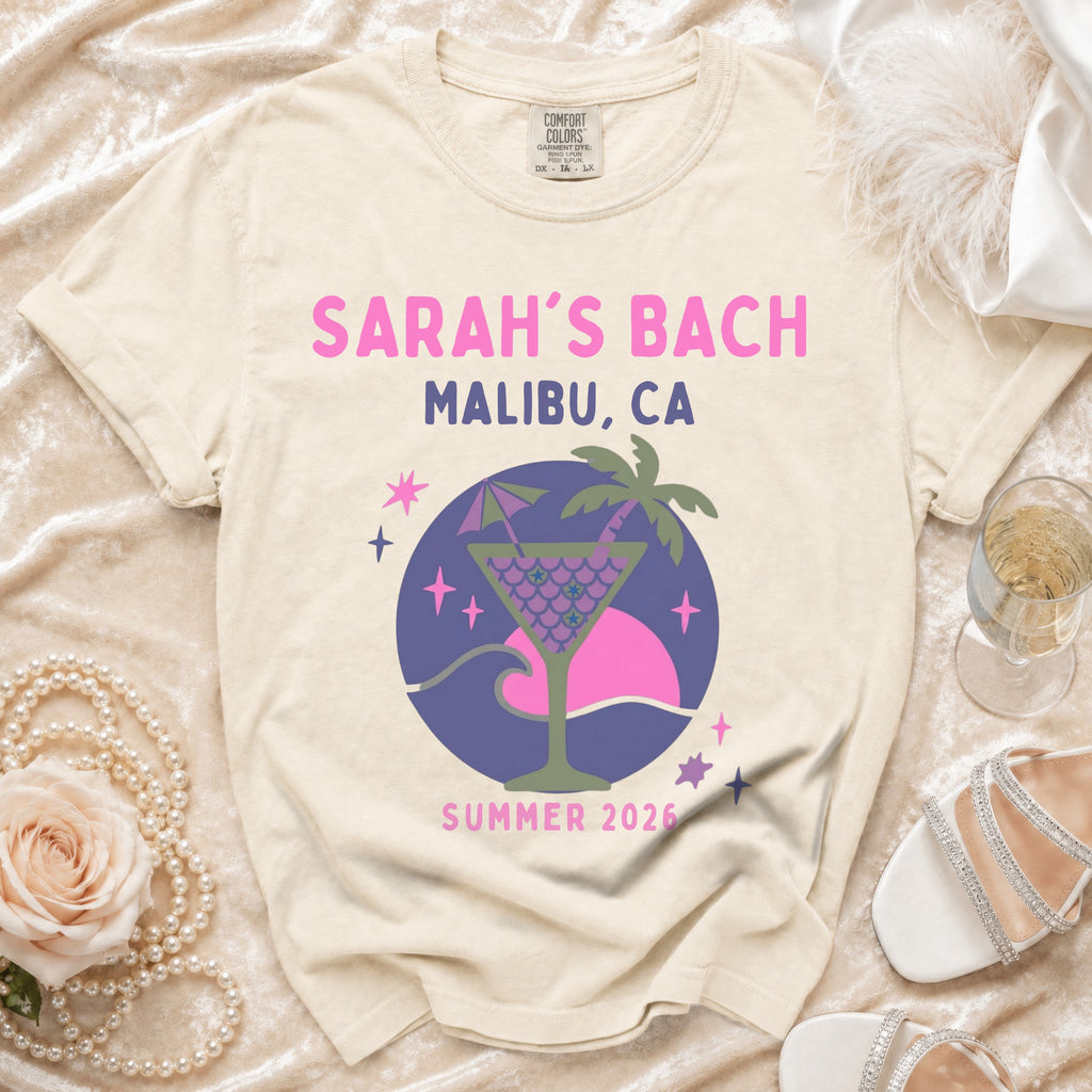 T-shirt with "Sarah's Bach Malibu CA Summer 2026" and tropical cocktail graphic.