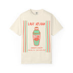 Cream t-shirt with "Last Splash" text, cocktail shaker, flamingo float, and event details.