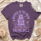 Purple t-shirt with a ghost bride graphic and text "Mother of the Bride Raising Hell and Paying Bills."