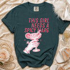 Teal t-shirt with "This girl needs a spicy marg" graphic and a margarita.