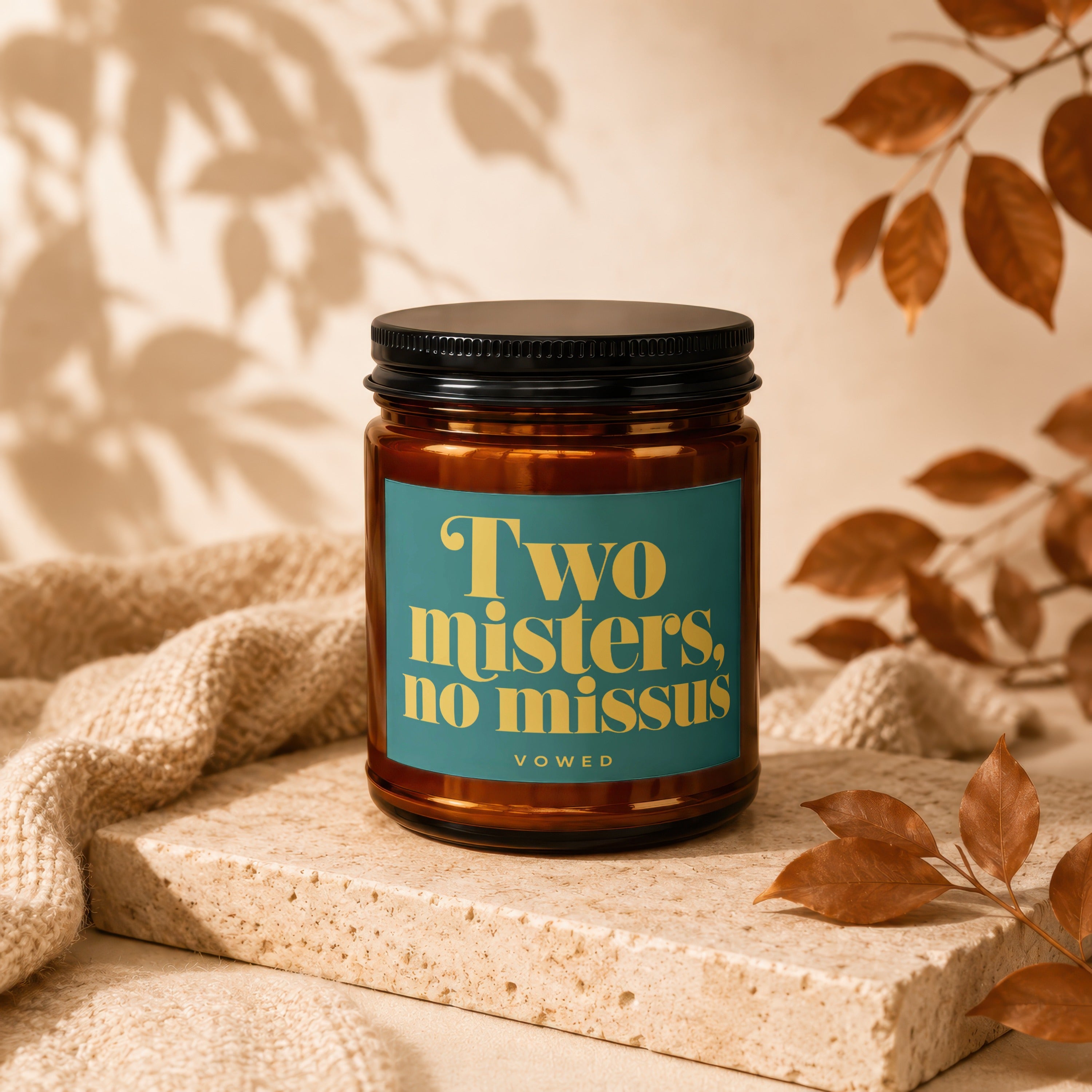 Amber candle in a brown jar with label: "Two misters, no missus"