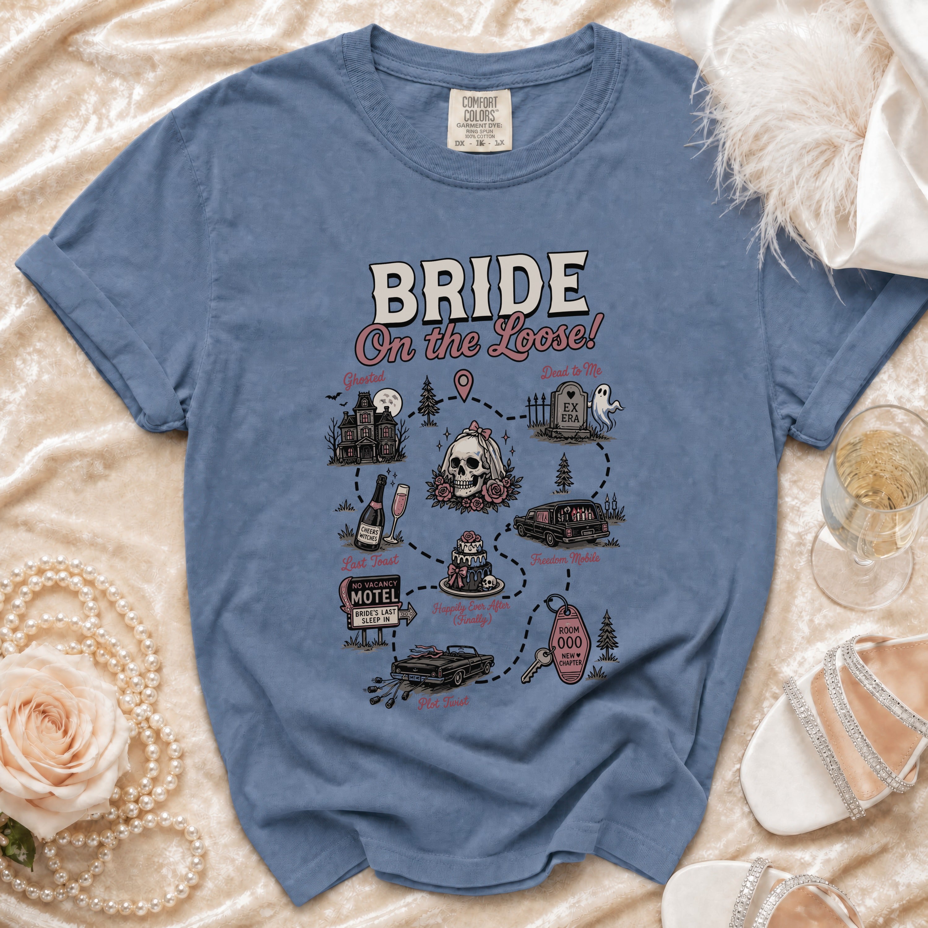 Blue t-shirt with "BRIDE On the Loose!" graphic and illustrated map.